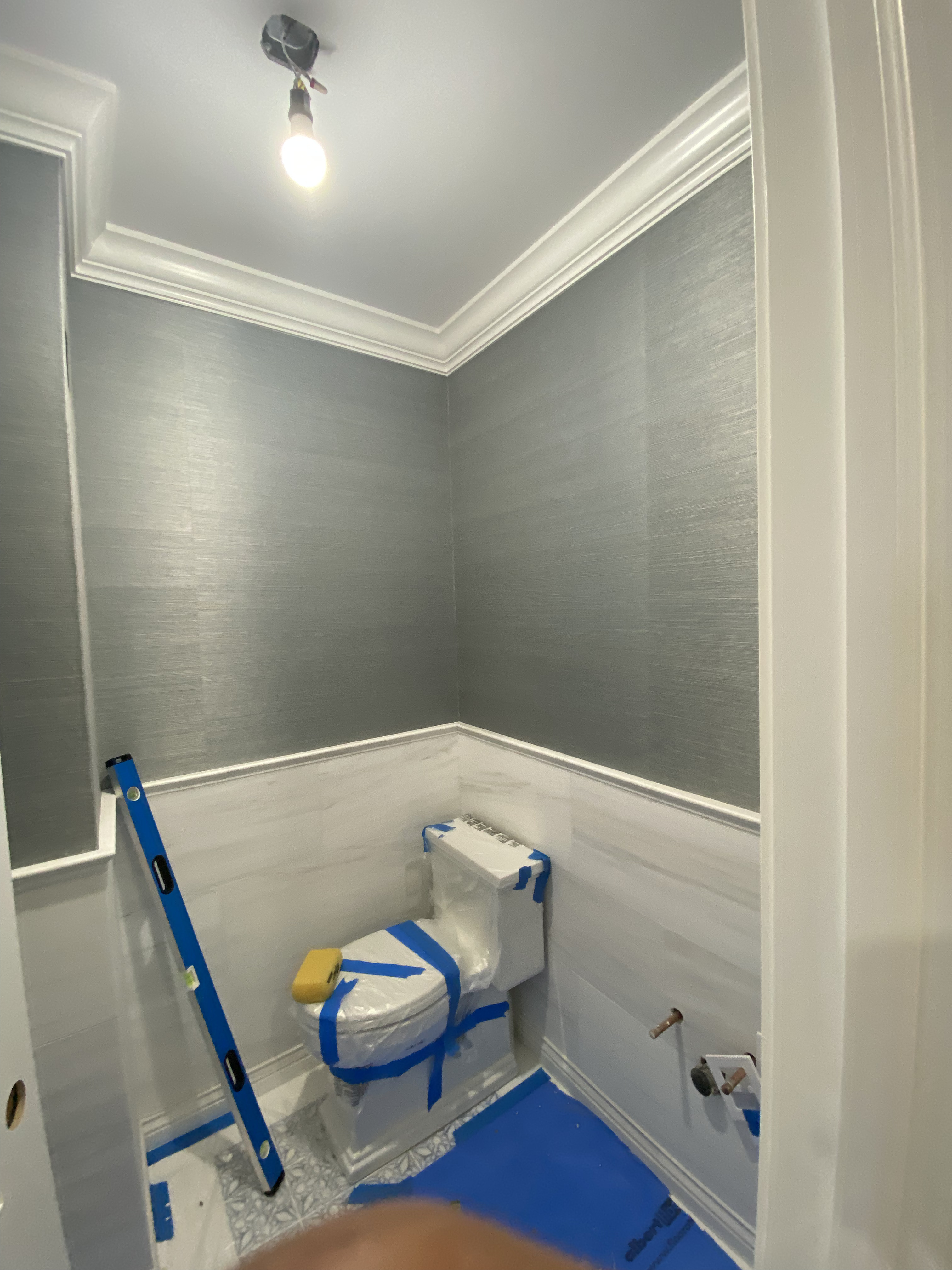 Children's room with playful wallpaper.