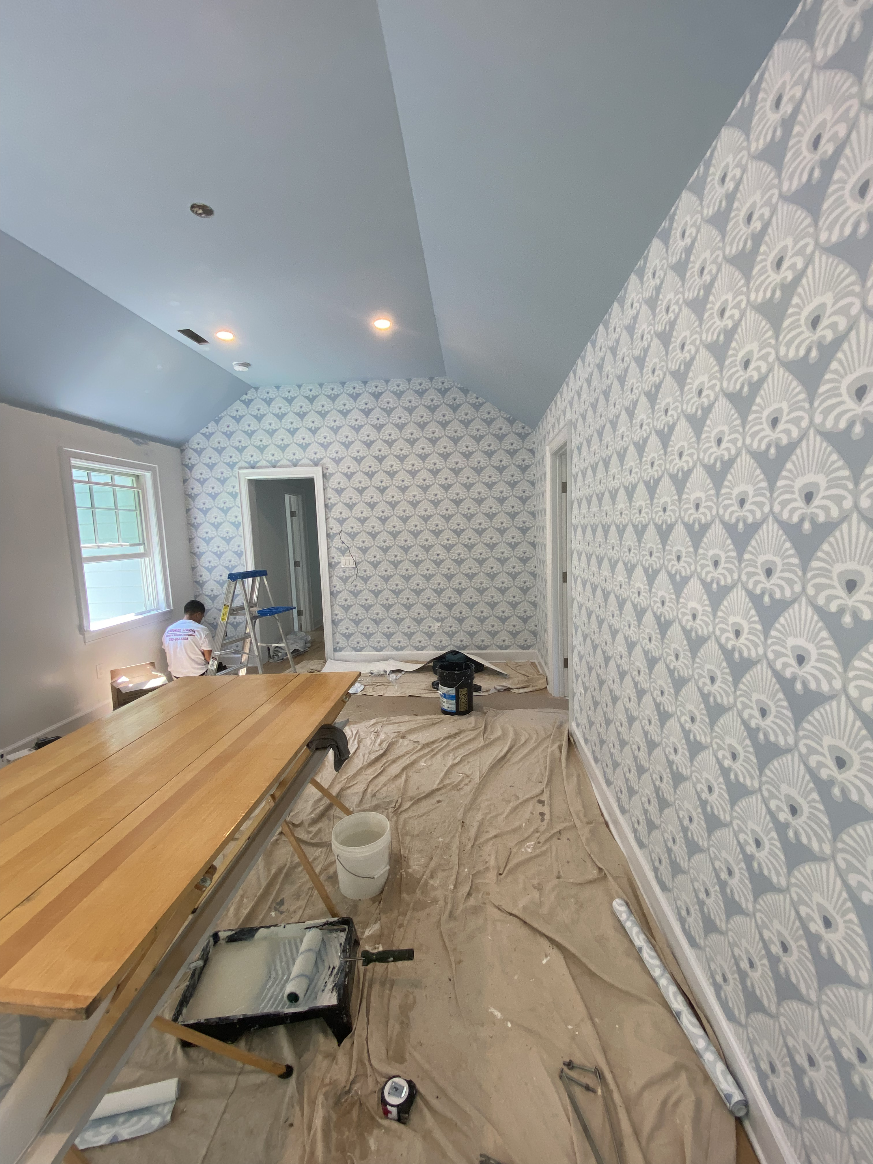 A detailed floral wallpaper installation.