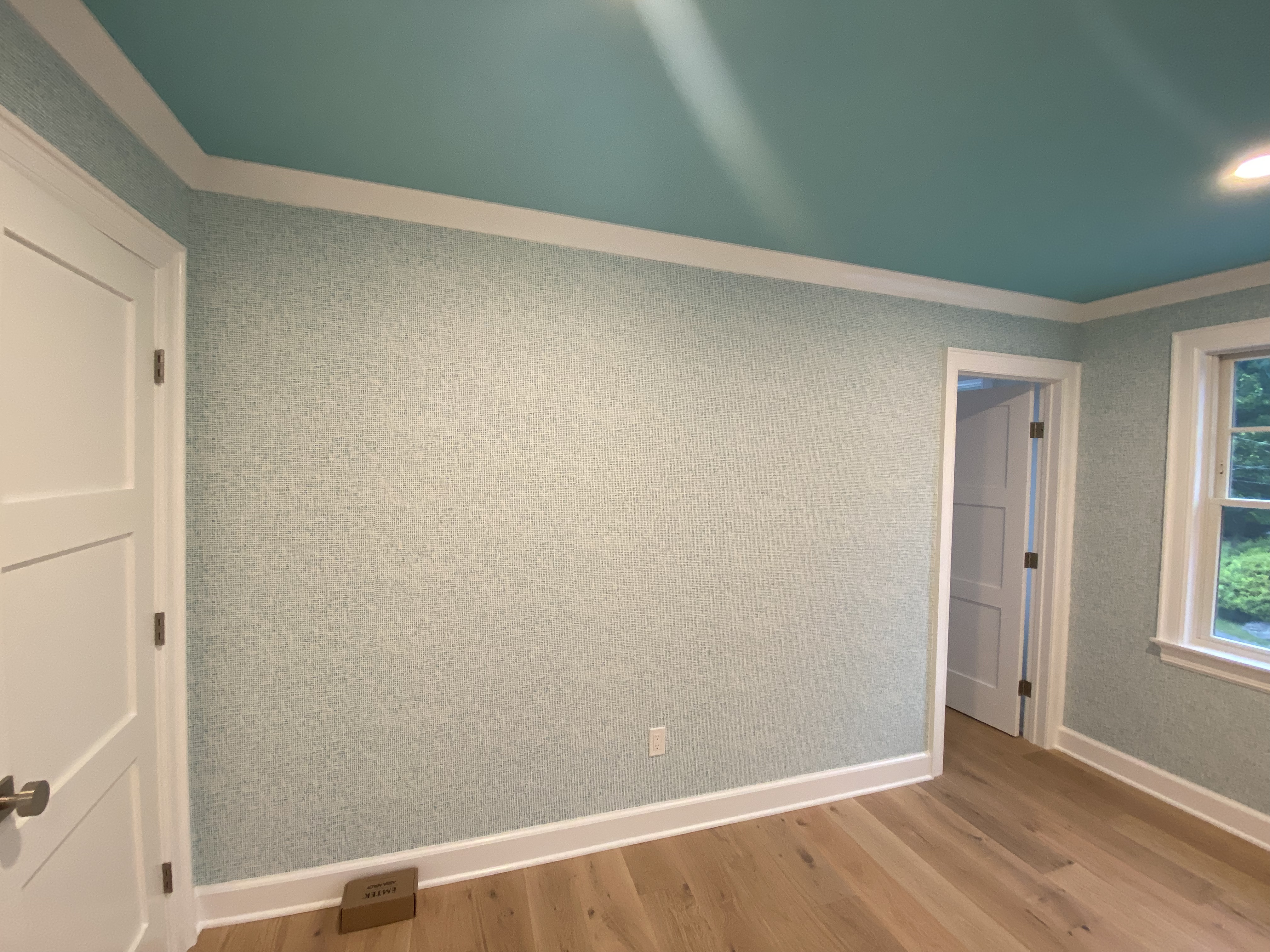 Textured wallpaper in a dining room.